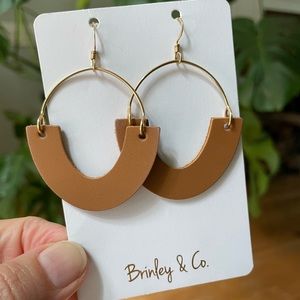 Brinley & Co. leather and 14k gold earrings.